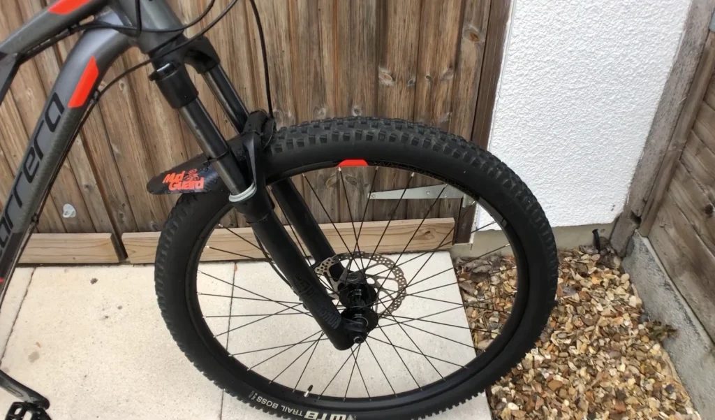 best full suspension mountain bikes under $1000 Carrera Titan X valve stem